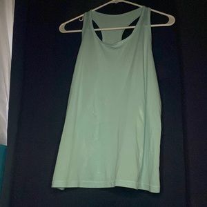 This a workout teal top size XXL it’s not true to size because it’s like a M